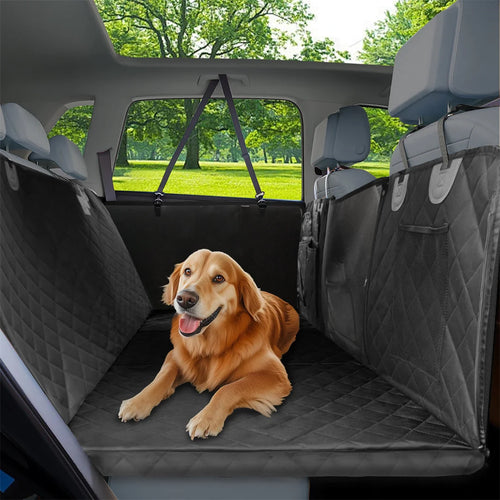 Dog lying on a waterproof quilted back-seat extender