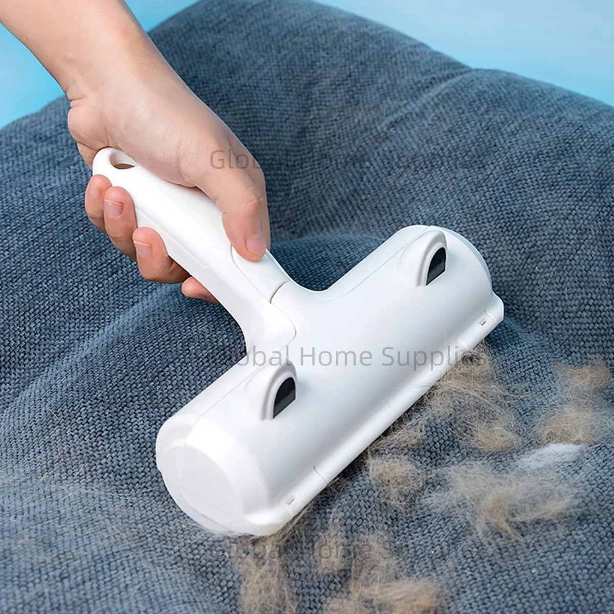 Self-cleaning pet hair roller lifting dog hair from a sofa